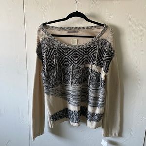 Cream and black knit long sleeved sweater